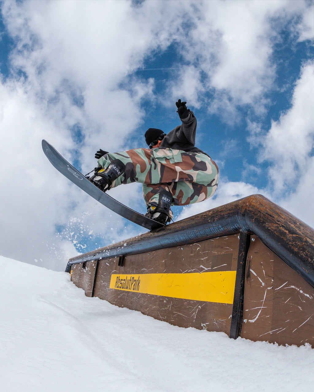 Rider grinding a feature using Bataleon Snowboard Disaster+ | Bataleon Snowboards 2025/2026